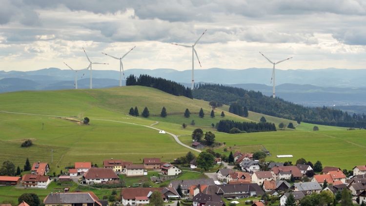Landscape with wind turbines on the horizon