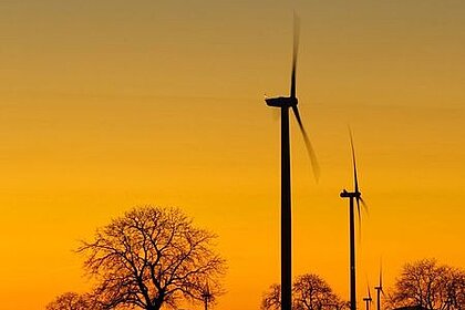 Wind turbines before sunset